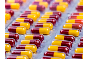 Red-yellow Amoxicillin capsules in blister pack