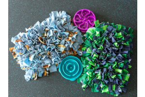 A selection of snuffle mats and slow feeder bowls for dogs