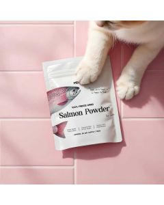 Merlins 100% Freeze Dried Salmon Powder on a pink background, with a cat's paw on the pouch.